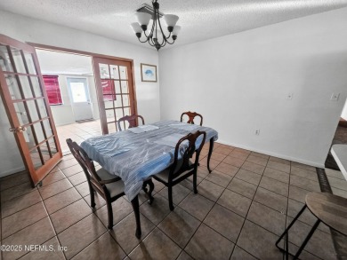 Welcome to this charming 3 bed, 2 bath brick POOL home sitting