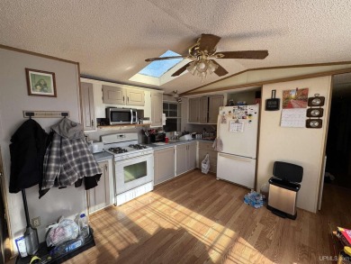 Check out this Park home in White Birch Village in the 55 and