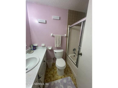 Welcome to this charming 3 bed, 2 bath brick POOL home sitting