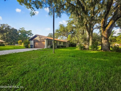 Welcome to this charming 3 bed, 2 bath brick POOL home sitting