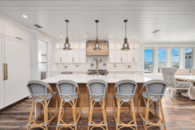 Discover an exquisite home situated on the coveted Sugar Sand