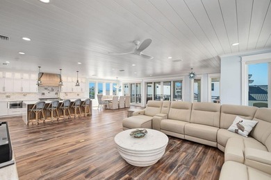 Discover an exquisite home situated on the coveted Sugar Sand