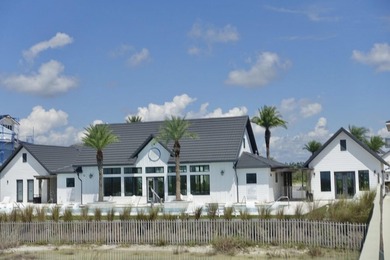 Discover an exquisite home situated on the coveted Sugar Sand