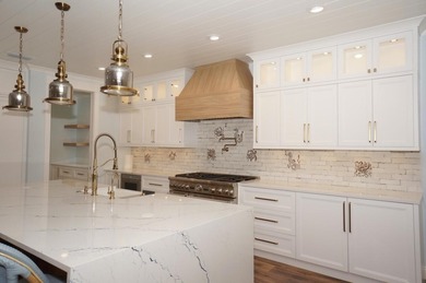 Discover an exquisite home situated on the coveted Sugar Sand