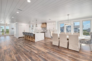 Discover an exquisite home situated on the coveted Sugar Sand