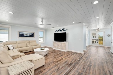 Discover an exquisite home situated on the coveted Sugar Sand