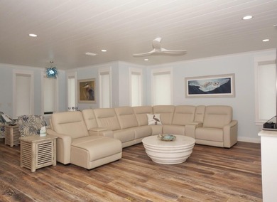 Discover an exquisite home situated on the coveted Sugar Sand