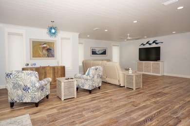 Discover an exquisite home situated on the coveted Sugar Sand