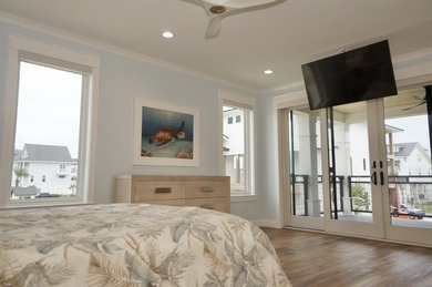 Discover an exquisite home situated on the coveted Sugar Sand