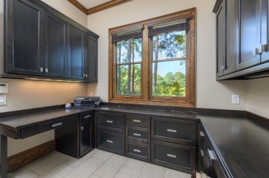 Experience refined golf living in this custom-built home located