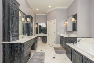 Experience refined golf living in this custom-built home located