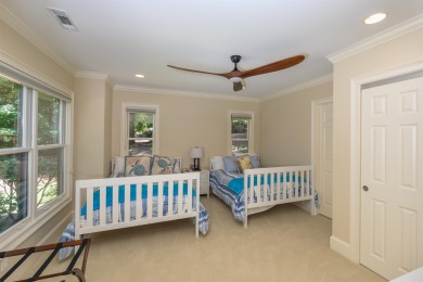 Experience refined golf living in this custom-built home located