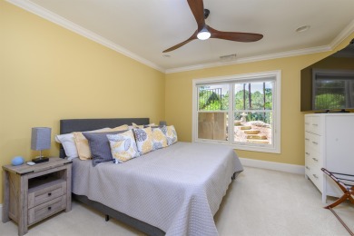 Experience refined golf living in this custom-built home located