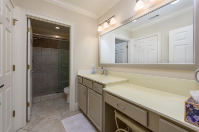 Experience refined golf living in this custom-built home located