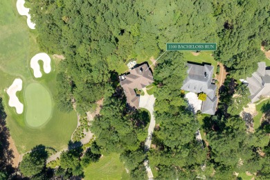 Experience refined golf living in this custom-built home located