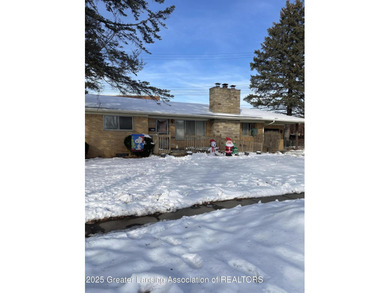 Spacious brick ranch, large rooms, 2 fireplaces. Home needs TLC