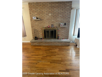 Spacious brick ranch, large rooms, 2 fireplaces. Home needs TLC