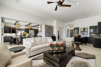 Experience desert luxury living in this impeccably reimagined 4