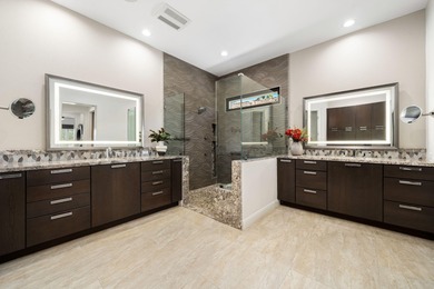 Experience desert luxury living in this impeccably reimagined 4