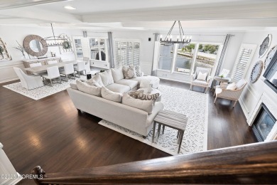 This meticulous waterfront stunner will take your breath away!