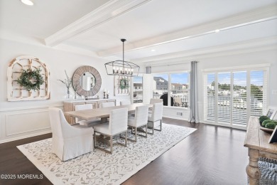 This meticulous waterfront stunner will take your breath away!