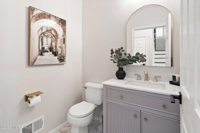 This meticulous waterfront stunner will take your breath away!