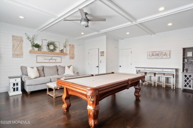 This meticulous waterfront stunner will take your breath away!