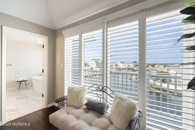 This meticulous waterfront stunner will take your breath away!