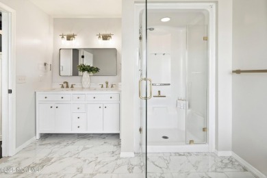 This meticulous waterfront stunner will take your breath away!