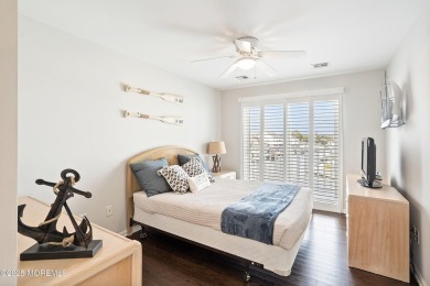 This meticulous waterfront stunner will take your breath away!