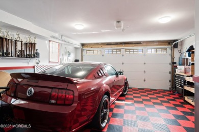 This meticulous waterfront stunner will take your breath away!