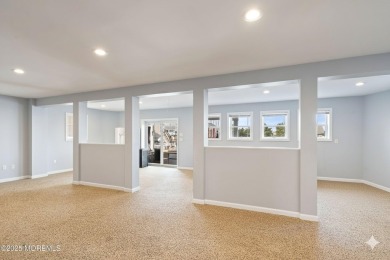 This meticulous waterfront stunner will take your breath away!