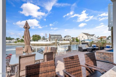 This meticulous waterfront stunner will take your breath away!