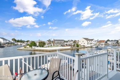 This meticulous waterfront stunner will take your breath away!