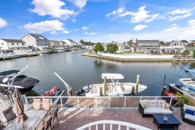 This meticulous waterfront stunner will take your breath away!