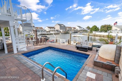 This meticulous waterfront stunner will take your breath away!