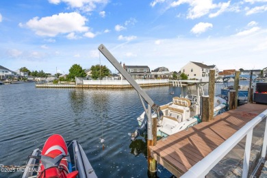 This meticulous waterfront stunner will take your breath away!