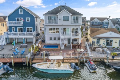 This meticulous waterfront stunner will take your breath away!