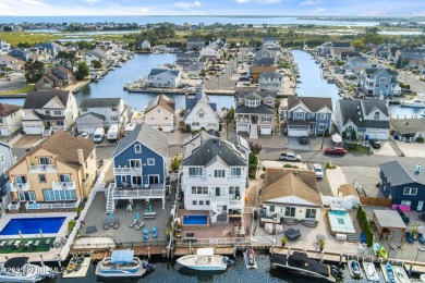 This meticulous waterfront stunner will take your breath away!