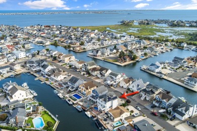 This meticulous waterfront stunner will take your breath away!