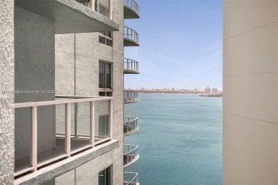 Live the vibrant Edgewater lifestyle in this impeccably