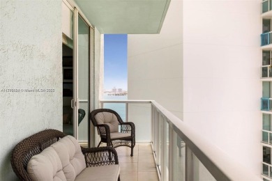 Live the vibrant Edgewater lifestyle in this impeccably