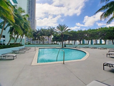 Live the vibrant Edgewater lifestyle in this impeccably