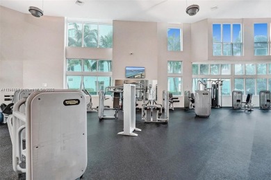 Live the vibrant Edgewater lifestyle in this impeccably