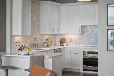 RIVERFRONT luxurious 2 bed/2 bath, 7th floor condo home in the