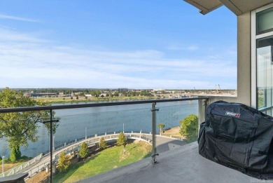 RIVERFRONT luxurious 2 bed/2 bath, 7th floor condo home in the