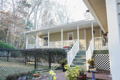 Nestled on a serene 3.26-acre lot, this beautiful 3-bedroom