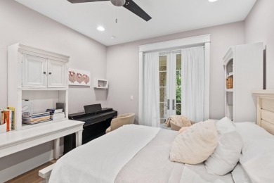 Welcome to refined coastal living in this exquisite end-unit