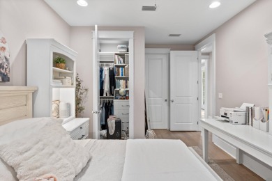 Welcome to refined coastal living in this exquisite end-unit