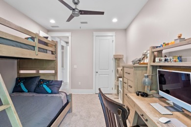 Welcome to refined coastal living in this exquisite end-unit